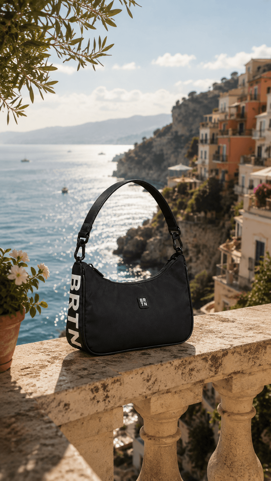 Brighton black shoulder bag overlooking the Amalfi coast