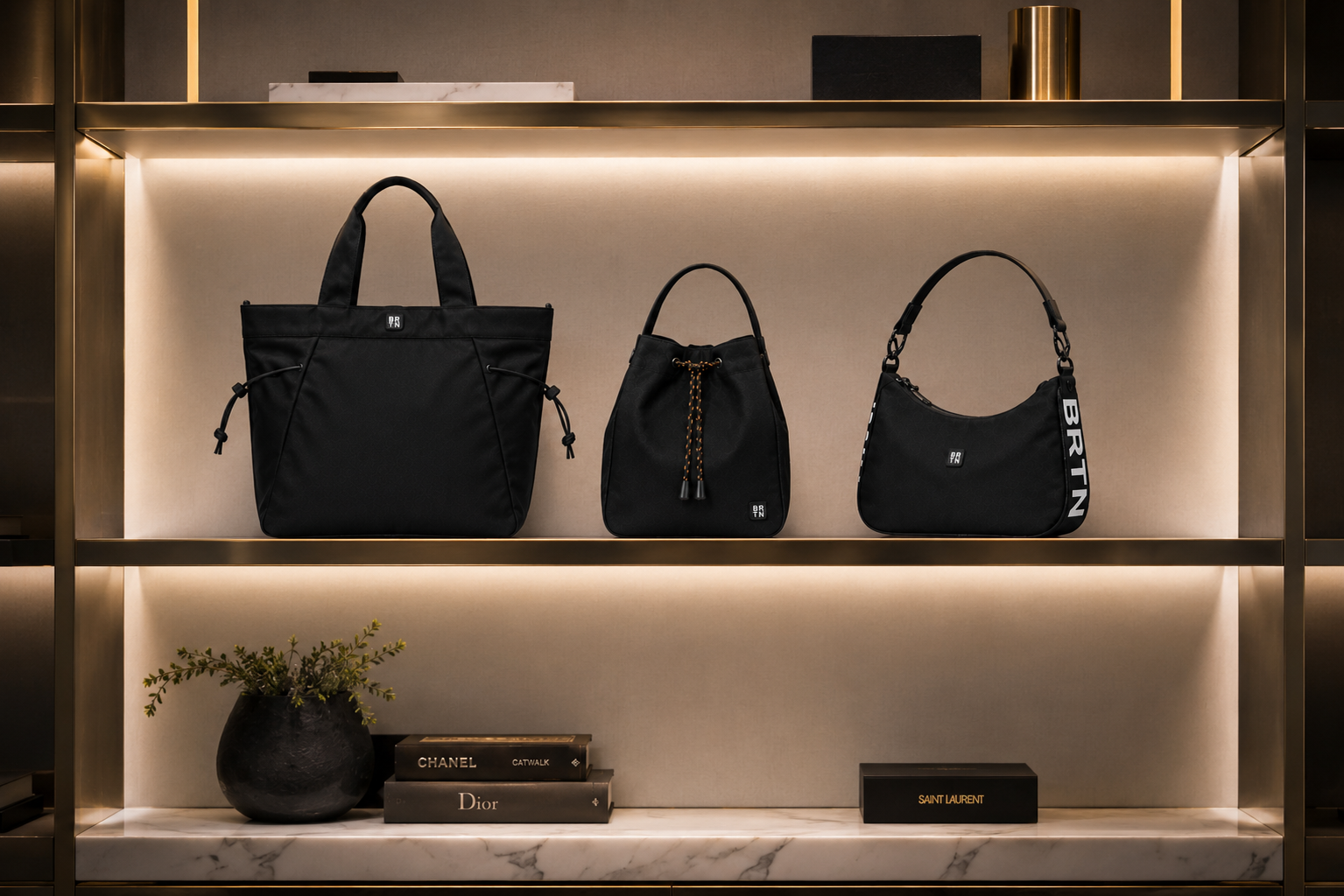 Brighton black tote, bucket and shoulder bags displayed on a lit boutique shelf